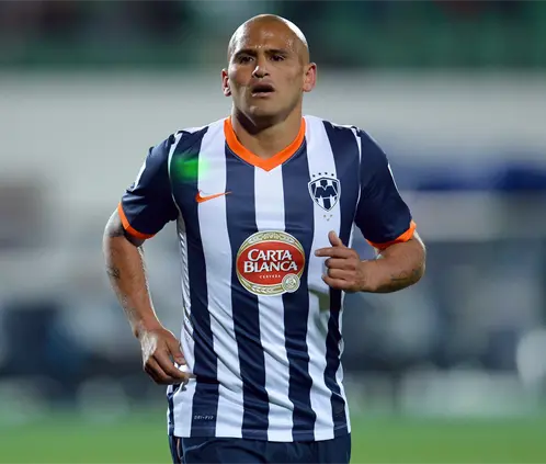 Humberto Suazo será reconocido por Rayados tras retirarse del futbol. Getty Images